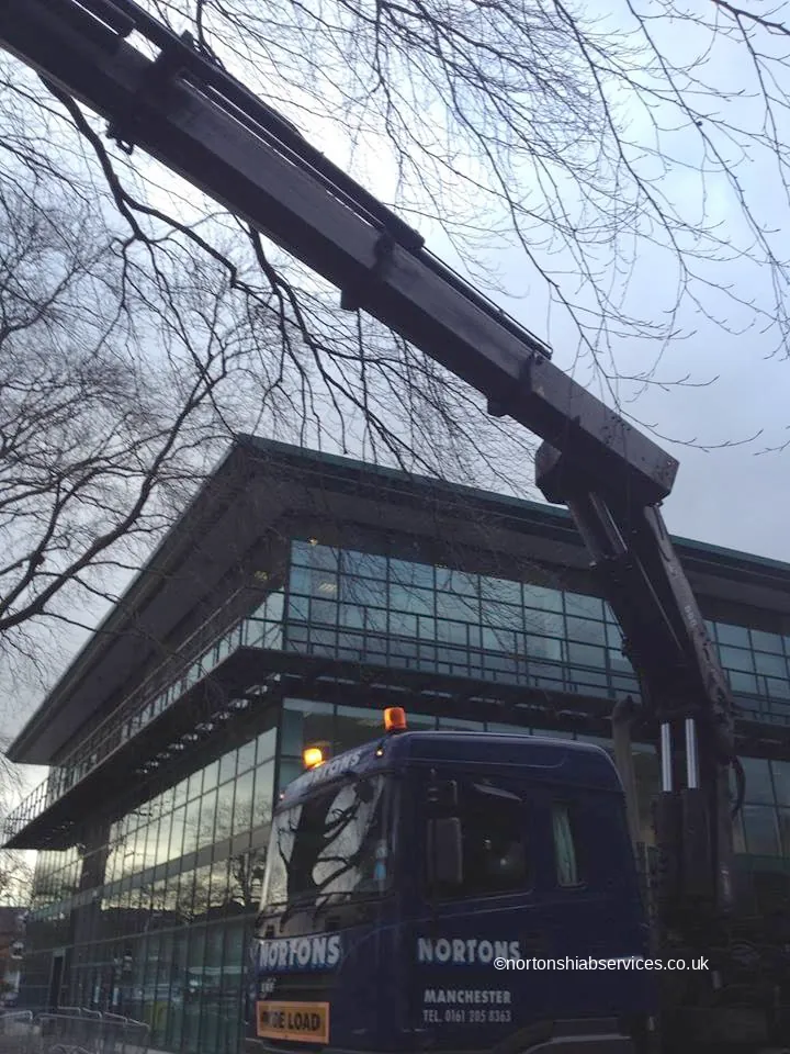 Nortons hiab lifting a large sign structure into position