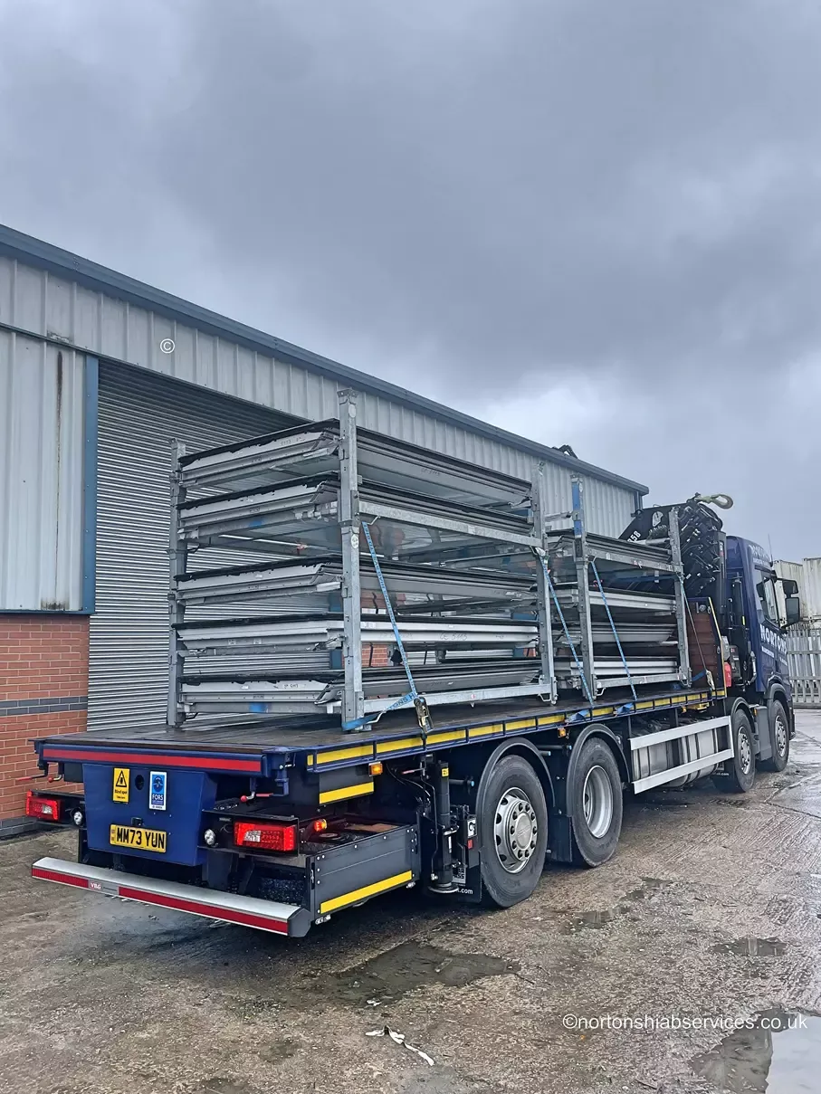 Stillages being unloaded from a Nortons lorry