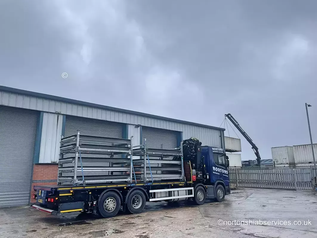 Steel stillages strapped down on a Nortons trailer