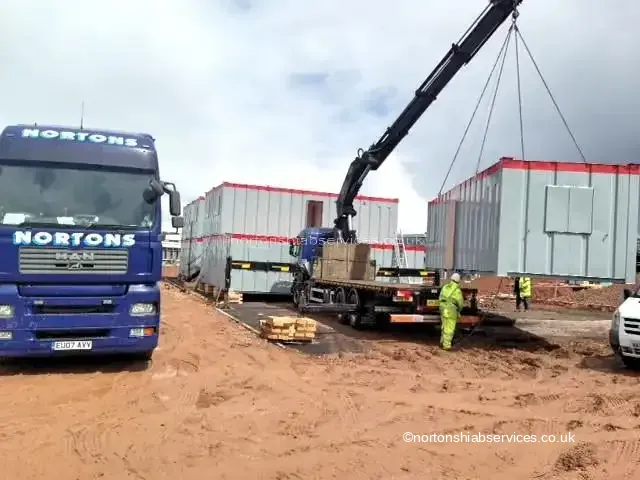 Nortons crane placing a site cabin on a Birmingham compound