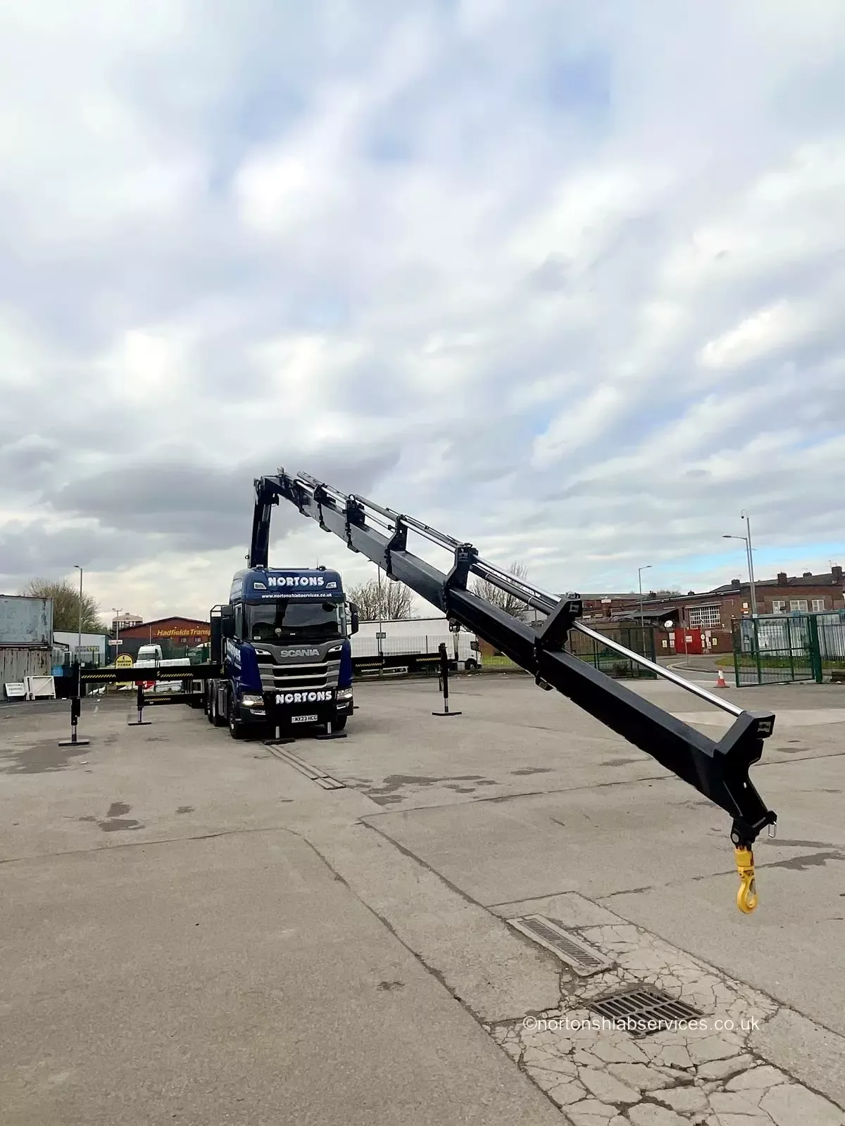 Nortons artic with a 658 hiab standing in the yard