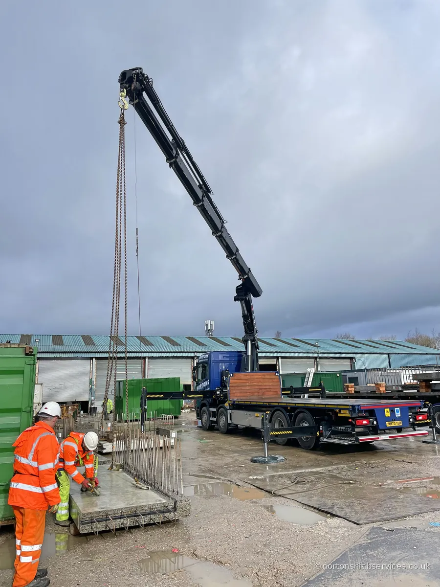 Nortons 858 hiab lifting a large steel structure into position