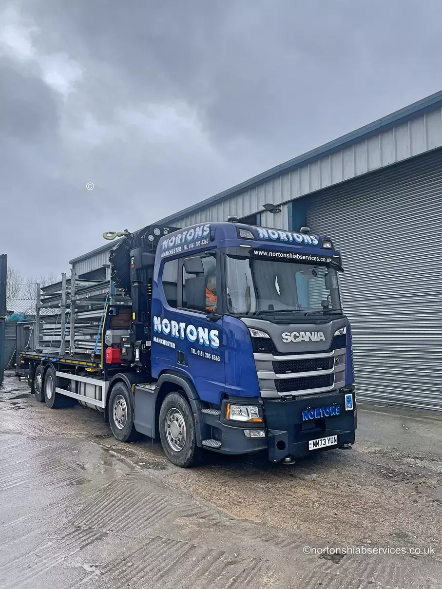Nortons Scania eight-wheel rigid hiab with the 858 crane folded behind the cab