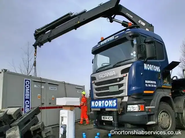 Nortons wagon and drag hiab working on a restricted site