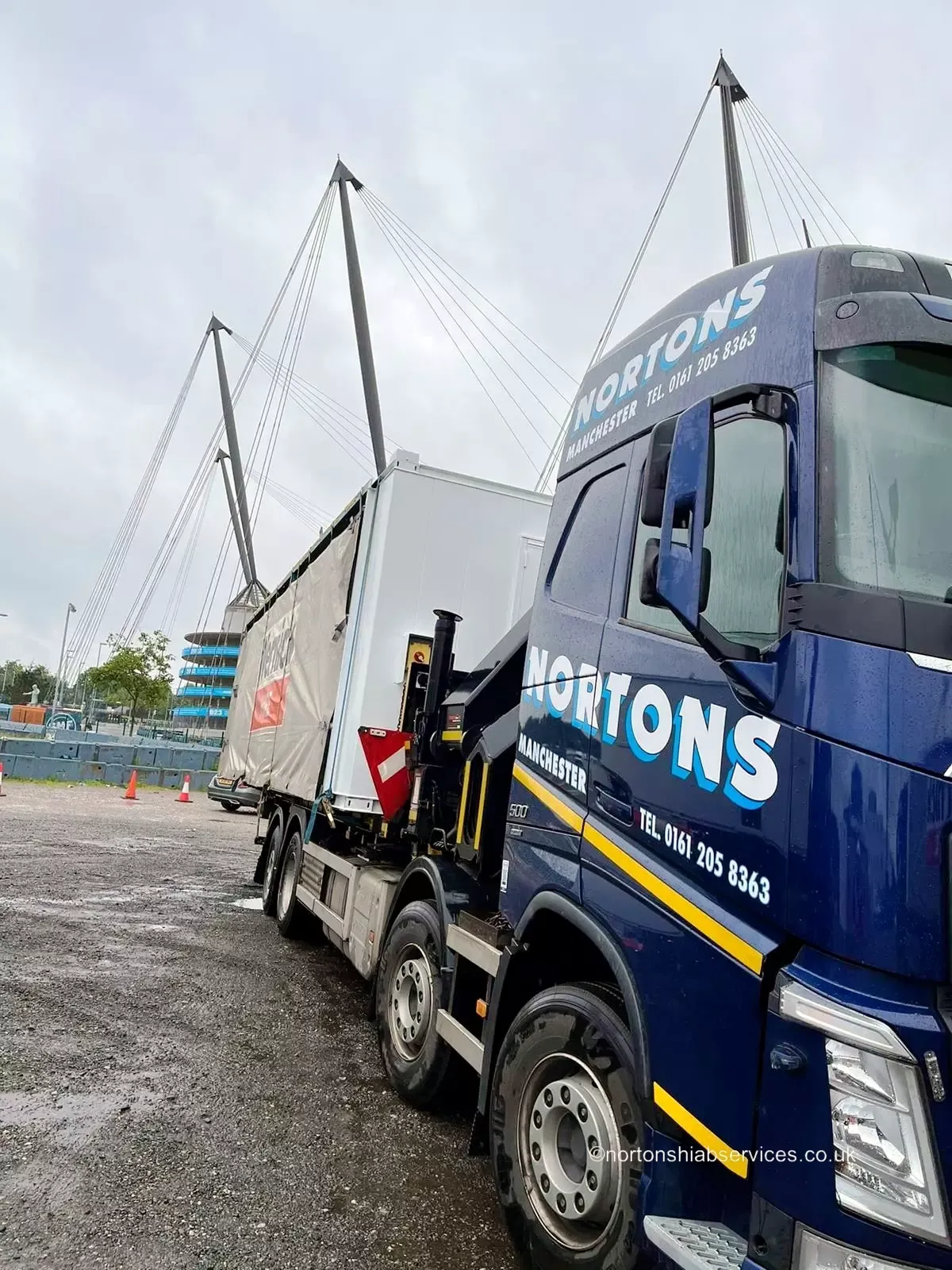 Nortons lorry carrying wide panel sections